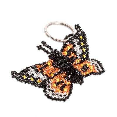 Glass beaded keychain, 'Fluttering Hopes' - Handcrafted Black and Orange Glass Beaded Butterfly Keychain