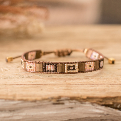 Beaded wristband bracelet, 'Geometric Brilliance' - Handmade Brown and Ivory Glass Beaded Wristband Bracelet