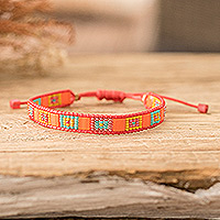 Beaded wristband bracelet, 'Geometric Vibrancy' - Handmade Orange and Aqua Glass Beaded Wristband Bracelet