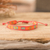 Beaded wristband bracelet, 'Geometric Vibrancy' - Handmade Orange and Aqua Glass Beaded Wristband Bracelet