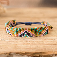 Beaded wristband bracelet, 'Enchanted Pyramids' - Handmade Geometric Colorful Glass Beaded Wristband Bracelet