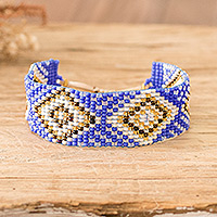 Beaded wristband bracelet, 'Wizard Geometry' - Blue and Golden Geometric Glass Beaded Wristband Bracelet