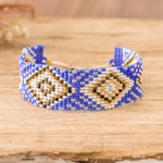 Beaded wristband bracelet, 'Wizard Geometry' - Blue and Golden Geometric Glass Beaded Wristband Bracelet