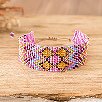 Beaded wristband bracelet, 'Dulcet Geometry' - Pink and Golden Geometric Glass Beaded Wristband Bracelet