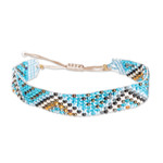 Beaded wristband bracelet, 'Magical Atitlan' - Handmade Sky Blue and Golden Glass Beaded Wristband Bracelet