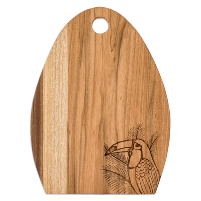 Wood cutting board, 'Toucan's Treats' - Semi-Oval Laurel Wood Cutting Board with Toucan Engraving