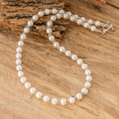 Sterling silver necklace with freshwater pearls and faux pearls in