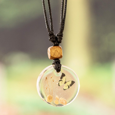 Resin pendant necklace, 'Planet Butterfly' - Handcrafted Butterfly-Themed Round Resin Pendant Necklace