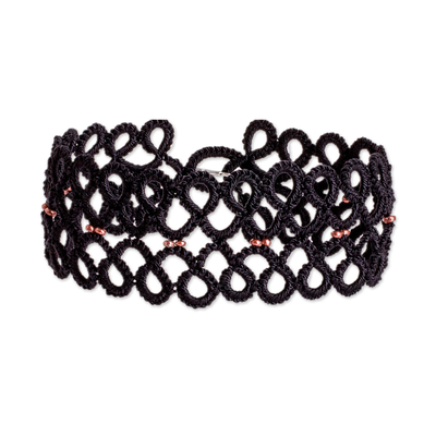 Glass beaded wristband bracelet, 'Gleams of Glamour' - Black Macrame Wristband Bracelet with Golden-Toned Beads