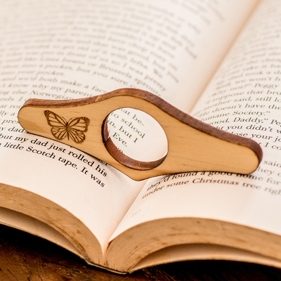 Wood page holder, 'Magical Reading' - Tropical Butterfly-Themed Handcrafted Pinewood Page Holder