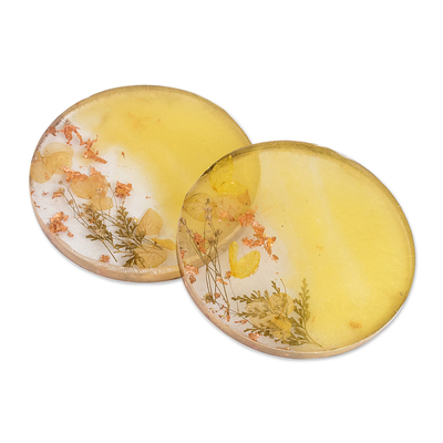 Resin coasters, 'Prosperous Blooming' (pair) - Pair of Handcrafted Floral Round Yellow Resin Coasters