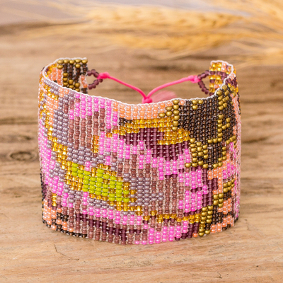 Glass beaded wristband bracelet, 'Dulcet Winds' - Adjustable Pink and Brown Glass Beaded Wristband Bracelet