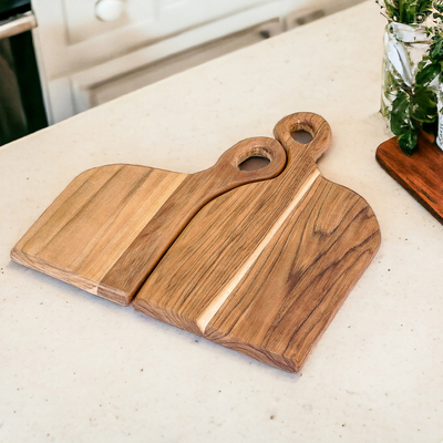 Teak wood cutting boards, 'Cooking Couple' (Set of 2) - Set of 2 Romantic Semi-Abstract Teak Wood Cutting Boards