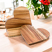 Teak wood coasters, 'Love Elixir' (3 pieces) - Heart-Shaped Teak Wood Coasters with Base (3 Pieces)