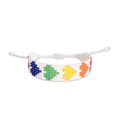 Glass beaded wristband bracelet, 'Rainbow Love' - Rainbow-Toned Heart-Themed Glass Beaded Wristband Bracelet