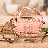 Handwoven sling bag, 'Peachy Chic' - Handwoven Recycled Vinyl Cord Sling and Handle Bag in Peach