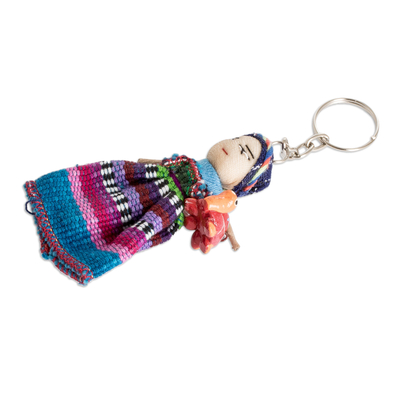 Schlüsselanhänger aus Baumwolle - Baumwoll-Schlüsselanhänger mit einer Sorgenpuppe, die eine Keramikschildkröte hält