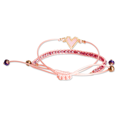 Glass beaded friendship bracelets, 'Adorable Bond' (set of 2) - Set of 2 Handcrafted Pink Heart-Themed Friendship Bracelets