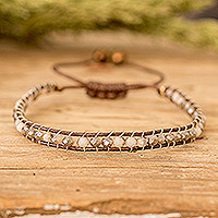 Glass beaded wristband bracelet, 'Sunrise Splendor' - Adjustable Ivory and Brown Glass Beaded Wristband Bracelet