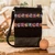 Leather-accented cotton sling, 'Avian Night' - Bird-Themed Leather-Accented Cotton Sling Bag in Black
