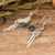 Jade dangle earrings, 'Green Quetzal Flight' - Sterling Silver Dark Green Jade Quetzal Bird Dangle Earrings