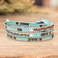 Glass beaded wrap bracelet, 'San Cristobal in Heaven' - Handcrafted Sky Blue and Brown Glass Beaded Wrap Bracelet