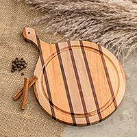 Wood cutting board, 'Cycles of Flavor' - Striped Laurel, Cedar and Pinewood Cutting Board with Handle