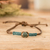 Men's jade pendant bracelet, 'Wild Jade in Dark Green' - Men's Dark Green Jade Pendant Bracelet with Macrame Accent