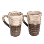 Ceramic mugs, 'Authentic Flavor' (pair) - Traditionally Crafted Ceramic Mugs in Ivory and Brown (Pair)
