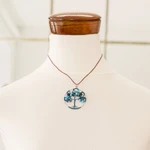 Jasper and quartz pendant necklace, 'Blue Jasper World' - Tree-Themed Round Blue Jasper and Quartz Pendant Necklace