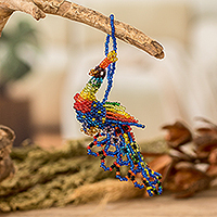 Glass beaded ornament, 'Colorful Real Beauty' - Colorful Glass Beaded Peacock-Themed Ornament from Guatemala