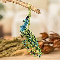 Glass beaded ornament, 'Green Real Beauty' - Glass Beaded Peacock-Themed Ornament in Green and Blue