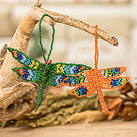 Glass beaded ornaments, 'Colorful Free Flight' (pair) - Two Glass Beaded Dragonfly-Themed Ornaments from Guatemala