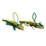 Glass beaded ornaments, 'Green Ferocious Friends' (pair) - Pair of Glass Beaded Crocodile Ornaments from Guatemala