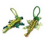 Glass beaded ornaments, 'Green Ferocious Friends' (pair) - Pair of Glass Beaded Crocodile Ornaments from Guatemala
