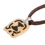 Coconut shell and lava stone pendant necklace, 'Spiritual Liberation' - Coconut Shell and Lava Stone Tijax Sign Pendant Necklace