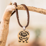 Coconut shell and lava stone pendant necklace, 'Dream Seeker' - Coconut Shell and Lava Stone K'at Sign Pendant Necklace