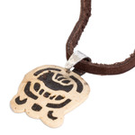 Coconut shell and lava stone pendant necklace, 'Dream Seeker' - Coconut Shell and Lava Stone K'at Sign Pendant Necklace