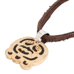 Coconut shell and lava stone pendant necklace, 'Harmony and Peace' - Coconut Shell and Lava Stone Ak'ab'al Sign Pendant Necklace