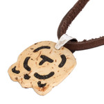 Coconut shell and lava stone pendant necklace, 'Strength and Renewal' - Coconut Shell and Lava Stone Iq' Sign Pendant Necklace