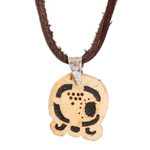 Coconut shell and lava stone pendant necklace, 'Spiritual Union' - Coconut Shell and Lava Stone Kawoq Sign Pendant Necklace