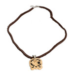 Coconut shell and lava stone pendant necklace, 'Spiritual Union' - Coconut Shell and Lava Stone Kawoq Sign Pendant Necklace