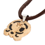 Coconut shell and lava stone pendant necklace, 'Spiritual Union' - Coconut Shell and Lava Stone Kawoq Sign Pendant Necklace