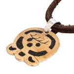 Coconut shell and lava stone pendant necklace, 'Maternal Earth' - Coconut Shell and Lava Stone Ix Sign Pendant Necklace