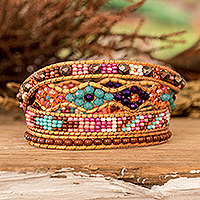 Crystal and glass beaded wrap bracelet, 'Encircling Vibrancy' - Handwoven Beaded Brown Wrap Bracelet with Pewter Button