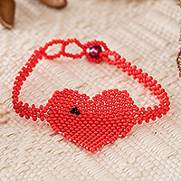 Beaded pendant bracelet, 'Crimson Love Inspiration' - Red Handcrafted Beaded Pendant Bracelet with Heart Motif