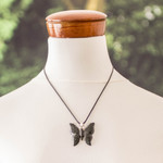 Jade pendant necklace, 'Butterfly Power' - Dark Green Jade Butterfly Pendant Necklace with Cotton Cord