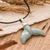 Jade pendant necklace, 'Blissful Fins' - Handcrafted Whale-Themed Light Green Jade Pendant Necklace