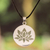 Sterling silver and jade pendant necklace, 'Perfect Joy' - Round Sterling Silver Lotus Pendant Necklace with Green Jade