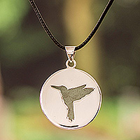 Sterling silver and jade pendant necklace, 'Harmonious Joy' - High-Polished Hummingbird-Themed Green Jade Pendant Necklace